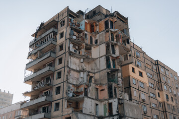 Impact on a high-rise building in the city of Dnipro, Ukraine. A residential building destroyed by an explosion after a Russian missile attack. Consequences of the explosion.