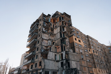 Impact on a high-rise building in the city of Dnipro, Ukraine. A residential building destroyed by an explosion after a Russian missile attack. Consequences of the explosion.