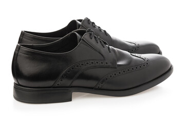 Black classic leather men's shoes with laces insulated on white background.