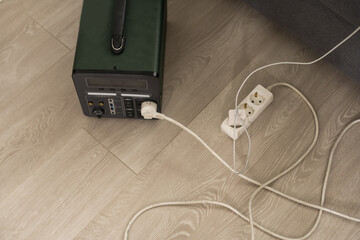 The inverter generator charges the power bank battery