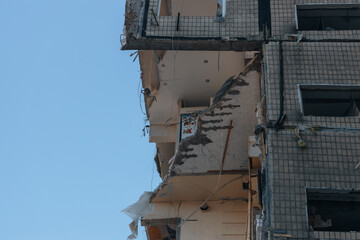 Impact on a high-rise building in the city of Dnipro, Ukraine. A residential building destroyed by an explosion after a Russian missile attack. Consequences of the explosion.
