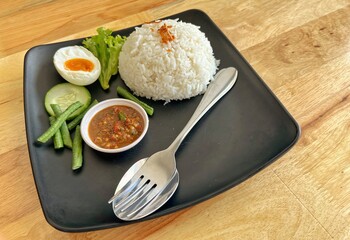 Asam Pedas Ikan translated as Spicy Sour Fish. Polular in Malaysia especially Malacca. Served on rice.