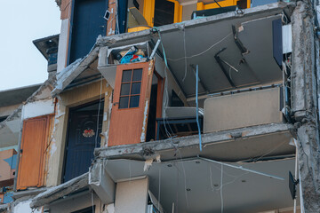 Impact on a high-rise building in the city of Dnipro, Ukraine. A residential building destroyed by an explosion after a Russian missile attack. Consequences of the explosion.