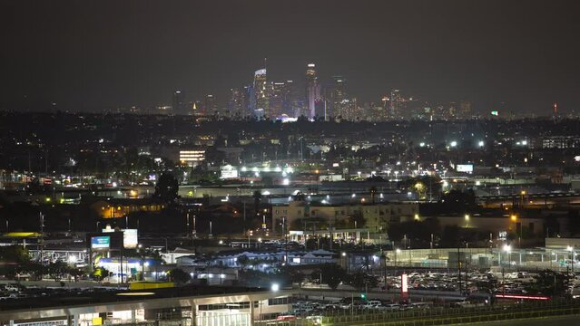 Generic Los Angeles CA Downtown Distant Night Cityscape Timelapse with Tall it Skyscrapers of the Famous California City on the Dark Horizon
