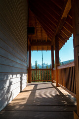 Outdoor deck and porch, looking out to mountains. Taken in Yoho National Park Canada