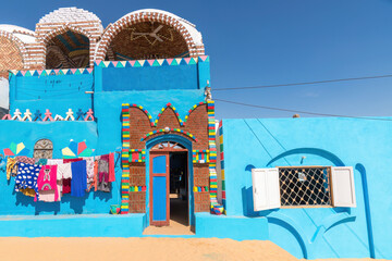 Aswan, Egypt; February 8, 2023 - Colourful Nubian houses in Aswan, Egypt