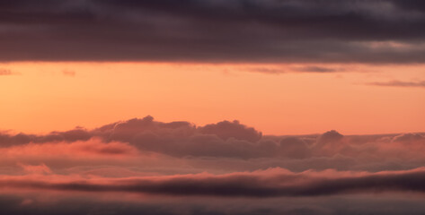 Aerial Cloudscape during morning Sunrise Sky. British Columbia, Canada. Nature Background