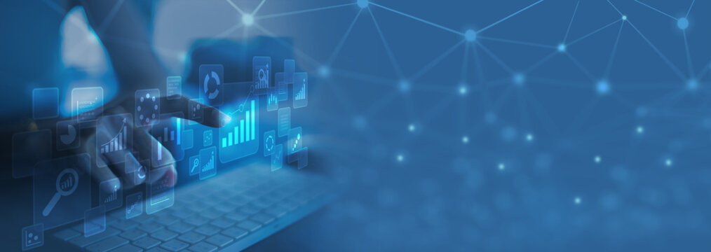 Businesswoman using laptop in data management.with a networked copy space	