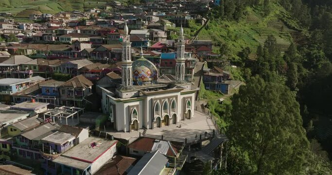 Aerial Panning Shot Of People At Famous Mosque On Nepal Van Java Hills