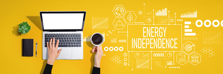 Energy Independence concept with person using a laptop computer