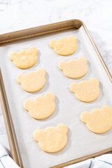 Panda shaped shortbread cookies with chocolate icing