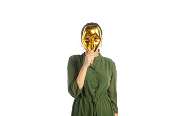 A young modern Indian Asian suspicious female hiding her face behind a mask looking at the camera...