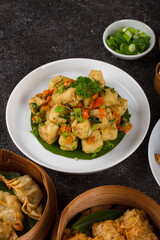 Tahu goreng Cabe Garam or Crispy Salt and Pepper Tofu served on white plate