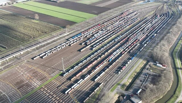 Take a virtual tour of the Kijfhoek train emplacement with this stunning aerial drone video, showcasing the transportation infrastructure and trains in motion.