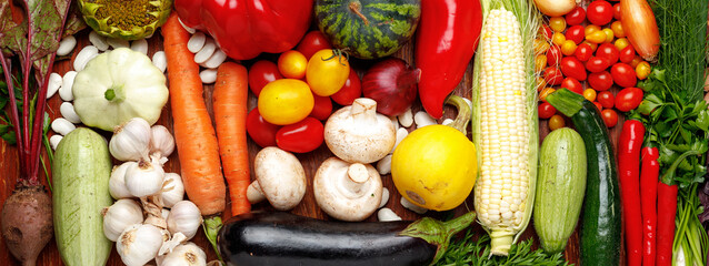 Wide background of farm organic vegetables.