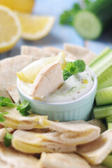 Tzatziki, Greek dip sauce with pita and cucumbers