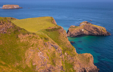 Portaneevey Port of the Caves. This vantage point, located on the Causeway Coastal Route in Northen Ireland, looks out over several islands namely, Rathelin, Carrick-a-Rede and Sheep Island.
