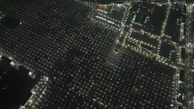 Aerial view of local market colourful tents at Minar Moshjid Tabling for the Global Muslims Congregation at night in Tongi, Dhaka, Bangladesh.