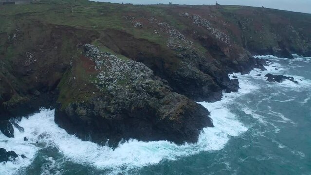 Aerial view of Botallack Mine along the Celtic Sea coastline, Carnyorth, Penzance, United Kingdom.