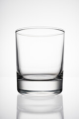 Empty low glass for a cocktail close-up on a white background