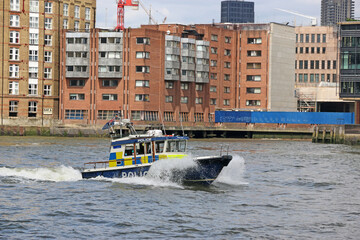 Obraz premium Police boat on the River Thames, London