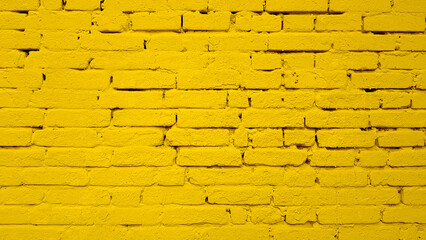Yellow wall brick background texture image.