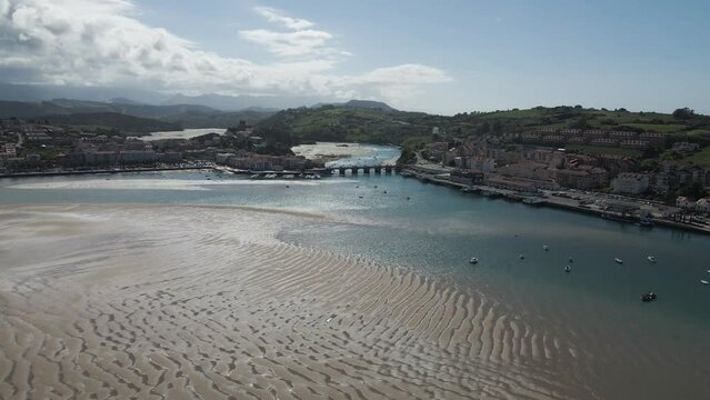 Aerial view of a bridge crossing the lake in Punta Candelaria, Cantabria, Spain.