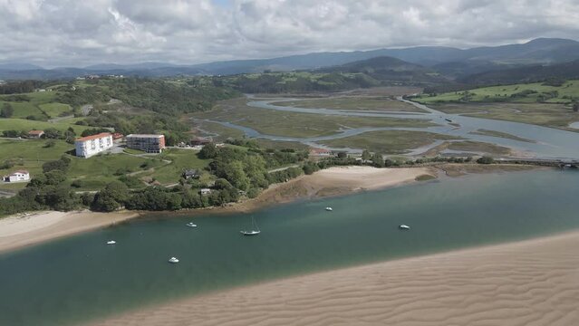Aerial view of a bridge crossing the lake in Punta Candelaria, Cantabria, Spain.