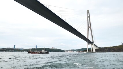 Vladivotok bridge. View from the moving ferry.