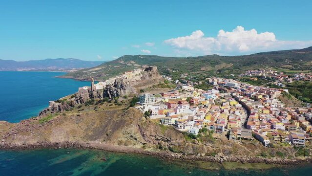Aerial view of Bosa old town on the promontory, a small colourful town near Oristano, Sardinia island, Italy.