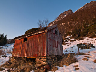 Decaying barn in Northern Norway landscape