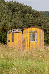 Old wooden constructions wagon on a meadow in Germany