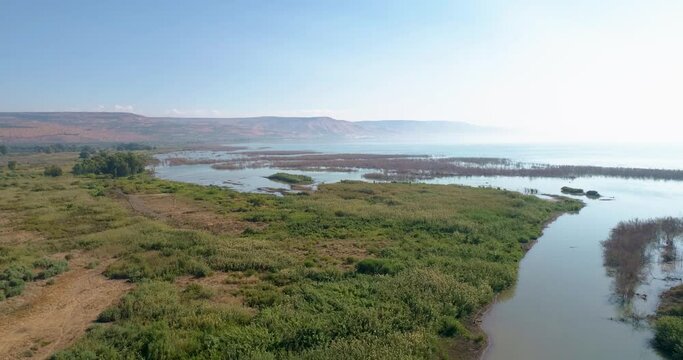 Sea of Galilee, Israel - 4 November 2022: Aerial view of people kayaking in a lake.