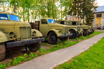 Rusty soviet retro trucks in Open air Museum of Folk Architecture and Folkways of Middle Naddnipryanschina in Pereyaslav, Ukraine