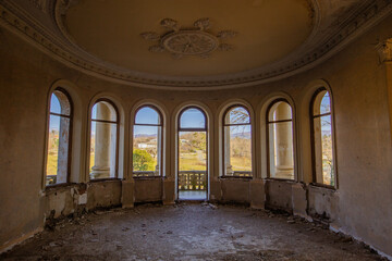 Large round hall with balcony old abandoned mansion