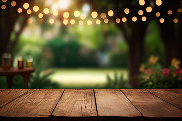 Empty wooden table with party in garden background blurred