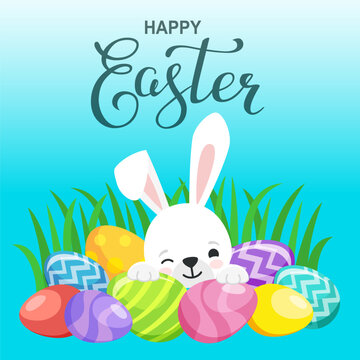 Card with bright easter eggs, calligraphy text Happy Easter and cute bunny looks out of the hole