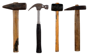 Four different hammers used in a machine shop on an isolated background.