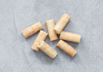 Vegan Sweet waffle rolls. Light grey background. Top view