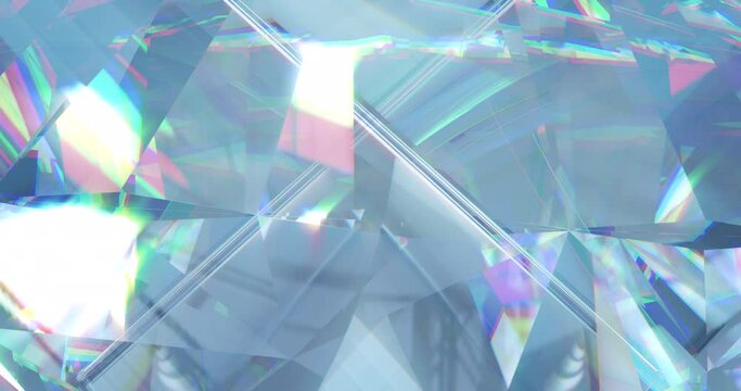 Animation of clear shiny prism moving over light spots