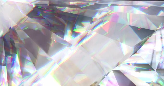 Animation of clear shiny prism moving over light spots