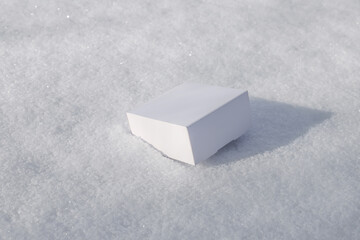 craft white square boxes on snow