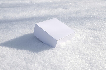 craft white square boxes on snow