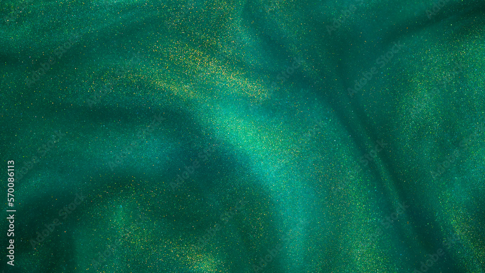 Wall mural abstract magic green background with golden sparkles. photo of a green liquid with gold glitters. va