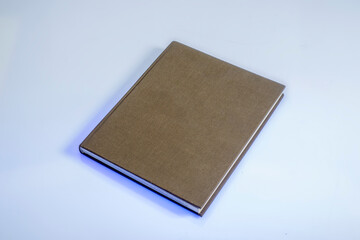book with a beautiful hard cover on a blue background
