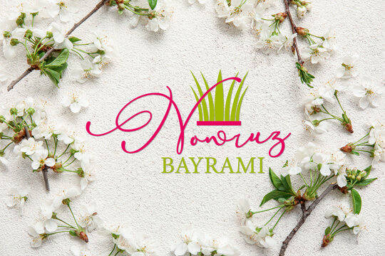 Beautiful greeting card for happy Novruz Bayram with blossoming spring branches