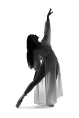 Silhouette of female ballerina dancing on white background