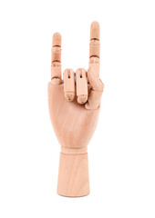 Decorative wooden hand showing "devil horns" on white background