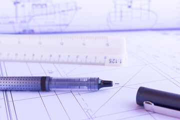 Closeup on black Needle Rollerball Pens Fine Point on architectural drawing