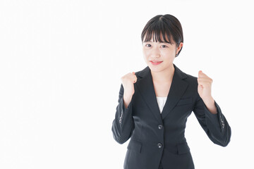 ガッツポーズをするビジネスウーマン